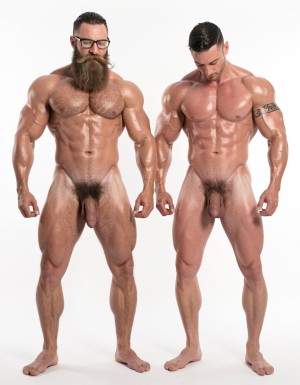 A highly detailed full-body photograph of both men standing completely naked in a bright white photography studio with perfect even lighting. On the left stands Hipsterbarba, the 40-year-old dominant muscle bear master: 180cm tall, 80kg with 8% body fat, powerful athletic physique, massive rounded pecs, defined six-pack, wide shoulders, thick vascular arms, powerful legs, wide V-shaped back, dense dark body hair covering chest, shoulders, abs, thick pubic bush and thighs. High fade undercut haircut, very thick long Bandholz beard reaching almost to his chest, thick curled handlebar mustache with spiral ends, black-rimmed glasses, small tattoo on right arm saying “hipsterbarba”. Thick cock with partial foreskin and visible pink glans, heavy low-hanging balls. He stands in a serious dominant pose, chest out, looking straight at the camera with authority, bare feet planted firmly.

On the right, slightly behind and in a submissive pose with head slightly bowed, stands Anil, the 25-year-old extreme bodybuilder slave: 175cm tall, 80kg with 6% body fat in peak competition condition, massive 127cm chest with huge thick pecs, 47cm vascular peaked arms, deep shredded eight-pack, tiny 60cm waist with extreme V-taper, wide flaring lats, high round bubbly 90cm glutes, 70cm massive shredded quads with razor sharp separation. Skin bronzed, paper-thin and shiny, completely smooth and hairless from the neck down. Thick veiny cock and large smooth shaved balls. Small black tattoo on right bicep clearly reading “Hipsterbarba mi amo”. Masculine face looking down submissively.

Both men fully naked head to toe, realistic skin texture, extreme muscle and hair details, professional studio photography.