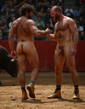 Un torero español musculoso y velludo de 50 años, con torso atlético y marcado, se muestra completamente desnudo, destacando su pene de 30 cm de longitud y 5 cm de grosor, perfectamente formado y rodeado de un denso vello púbico castaño oscuro. Sus testículos, perfectamente formados, cuelgan de forma prominente. La piel bronceada y sudorosa resalta su musculatura definida, con pectorales y abdominales bien marcados y sin grasa. El cabello largo y castaño oscuro está despeinado y sudoroso, con gotas de sudor resbalando por su frente y mejillas. Una barba incipiente y un vello corporal denso que se extiende por su pecho, piernas y brazos completan su apariencia viril. Lleva zapatillas doradas en sus pies.

A su lado, un hombre musculoso y velludo de 30 años, completamente desnudo, muestra un pene de 30 cm de longitud y 4 cm de grosor, hermoso y perfecto, rodeado de un denso vello púbico pelirrojo. Su piel bronceada y sudorosa muestra una musculatura definida, con pectorales y abdominales muy marcados. Tiene cabello pelirrojo despeinado y sudoroso. Tiene una barba pelirroja densa pero bien recortada. El vello corporal pelirrojo denso cubre su pecho, y tiene mucho vello pelirrojo en sus piernas y brazos, lo que realza su apariencia masculina y atlética. Están andando en la plaza de toros con un toro salvaje. Se aman

Ambos hombres se encuentran en una plaza de toros, con sombras que resaltan su musculatura y vello corporal, creando un ambiente sensual y cargado de tensión. Están en pleno acto de pasión, con sus penes erectos y testículos prominentes ,destacando su musculatura, vello corporal y atributos viriles en una imagen impactante y llena de energía. La escena está llena de sensualidad y poder, con los dos hombres como protagonistas, en un ambiente cargado de pasión y erotismo. La imagen es híper realista, con detalles de alta calidad, y muestra la unión de los dos hombres en un acto de pasión y dominio, con sus cuerpos musculosos y velludos completamente desnudos y visibles, mostrando su excitación y pasión en cada detalle. Tienen sus penes erectos. Están totalmente desnudos. Tiene un pene de 30 cm de longitud y 5 cm de diámetro.