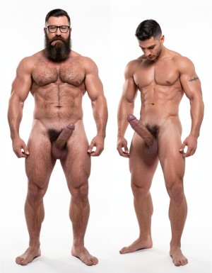 A highly detailed full-body photograph of both men standing completely naked in a bright white photography studio with perfect even lighting. On the left stands Hipsterbarba, the 40-year-old dominant muscle bear master: 180cm tall, 80kg with 8% body fat, powerful athletic physique, massive rounded pecs, defined six-pack, wide shoulders, thick vascular arms, powerful legs, wide V-shaped back, dense dark body hair covering chest, shoulders, abs, thick pubic bush and thighs. High fade undercut haircut, very thick long Bandholz beard reaching almost to his chest, thick curled handlebar mustache with spiral ends, black-rimmed glasses, small tattoo on right arm saying “hipsterbarba”. Thick cock with partial foreskin and visible pink glans, heavy low-hanging balls. He stands in a serious dominant pose, chest out, looking straight at the camera with authority, bare feet planted firmly.

On the right, slightly behind and in a submissive pose with head slightly bowed, stands Anil, the 25-year-old extreme bodybuilder slave: 175cm tall, 80kg with 6% body fat in peak competition condition, massive 127cm chest with huge thick pecs, 47cm vascular peaked arms, deep shredded eight-pack, tiny 60cm waist with extreme V-taper, wide flaring lats, high round bubbly 90cm glutes, 70cm massive shredded quads with razor sharp separation. Skin bronzed, paper-thin and shiny, completely smooth and hairless from the neck down. Thick veiny cock and large smooth shaved balls. Small black tattoo on right bicep clearly reading “Hipsterbarba mi amo”. Masculine face looking down submissively.

Both men fully naked head to toe, realistic skin texture, extreme muscle and hair details, professional studio photography.